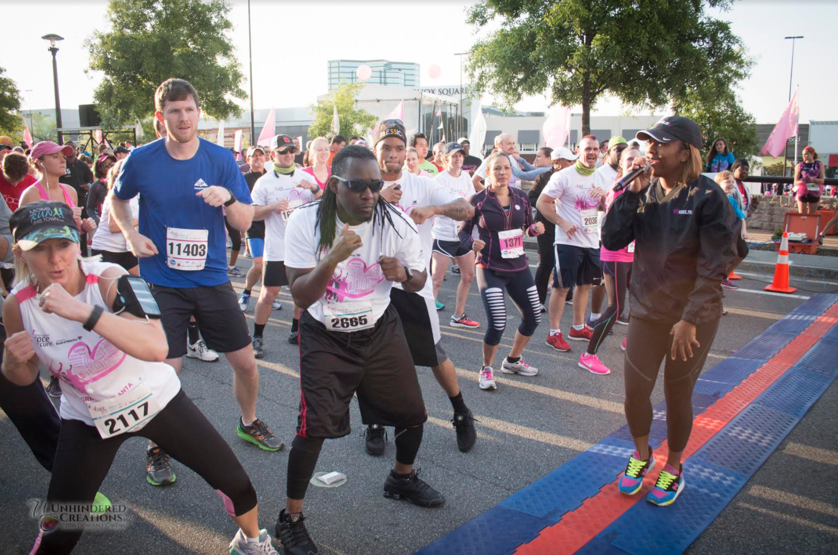 Madison James leads the 2016 Komen Race for the Cure warm up.
